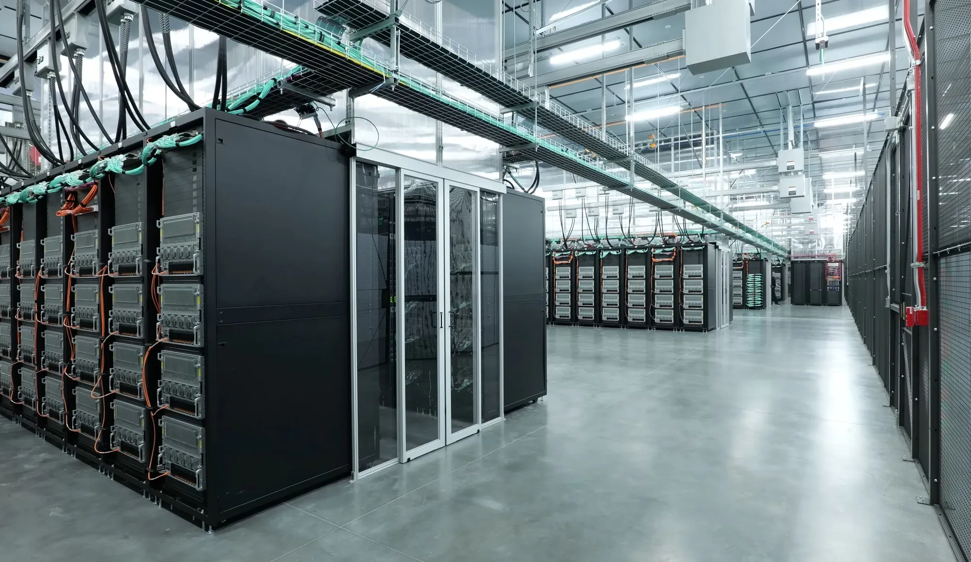 Server racks inside a large data-centre hall