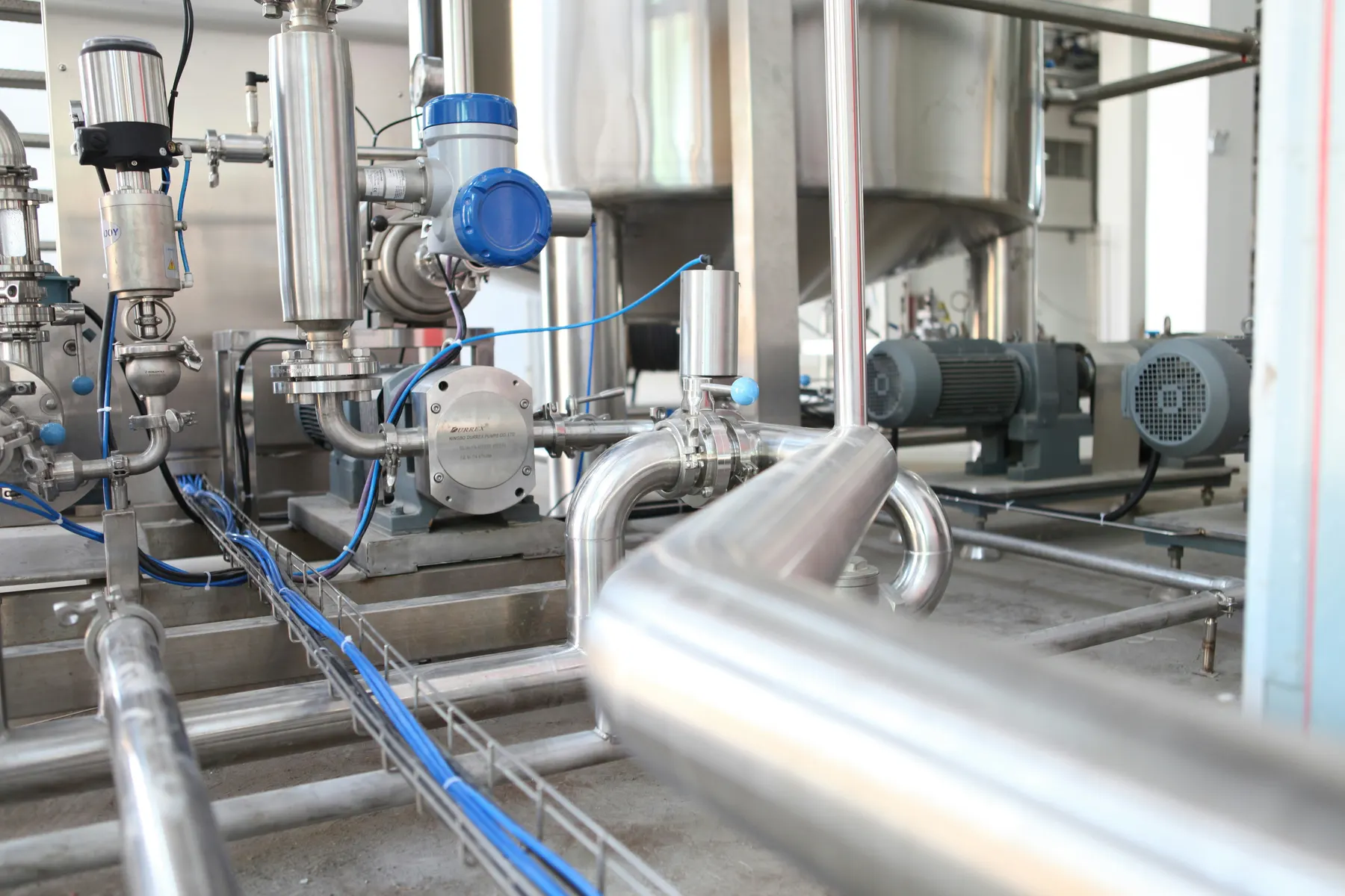 Stainless-steel industrial pipework, pumps and instrumentation